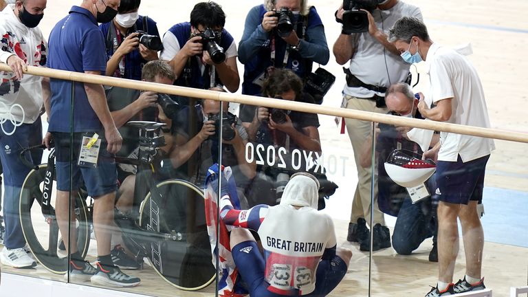 Jason Kenny is surrounded by photographers 