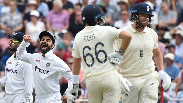 India's Virat Kohli celebrates the dismissal of England's Johnny Bairstow during first day of the first test cricket match between England and India, at Trent Bridge