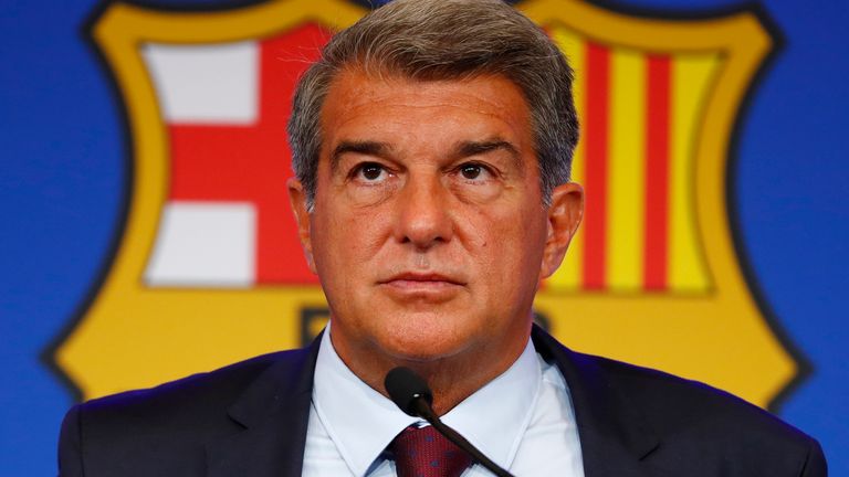 FC Barcelona club President Joan Laporta pauses during a news conference in Barcelona, Spain, Friday, Aug. 6, 2021. Barcelona announced on Thursday Aug. 5, 2021 that Lionel Messi will not stay with the club. He is leaving after 17 successful seasons in which he propelled the Catalan club to glory, helping it win numerous domestic and international titles since debuting as a teenager. (AP Photo/Joan Monfort)..
