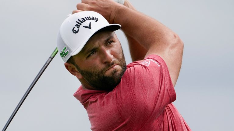 Jon Rahm, of Spain, tees off on the third hole in the final round at The Northern Trust golf tournament at Liberty National Golf Course Monday, Aug. 23, 2021, in Jersey City, N.J. (AP Photo/John Minchillo)