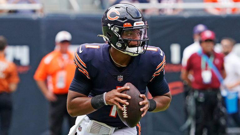 Chicago Bears quarterback Justin Fields (1) plays against the Buffalo Bills during an NFL preseason football game in Chicago, Saturday, Aug. 21, 2021. (AP Photo/David Banks)