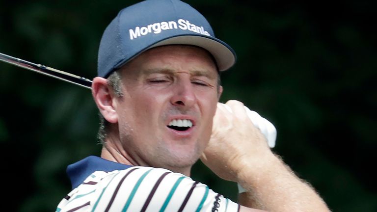 Justin Rose reacts as he hits his t ee shot on the second hole during the third round of the Wyndham Championship golf tournament at Sedgefield Country Club in Greensboro, N.C., Saturday, Aug. 14, 2021. (AP Photo/Chris Seward)