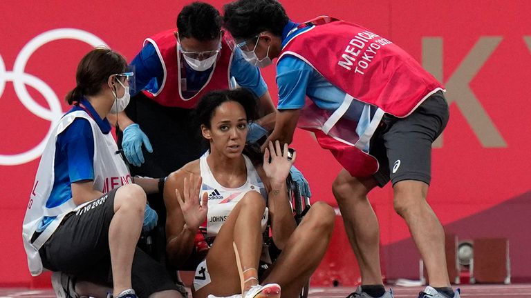 Johnson-Thompson refuses medical help after dropping to the track in the 200m event in the heptathlon
