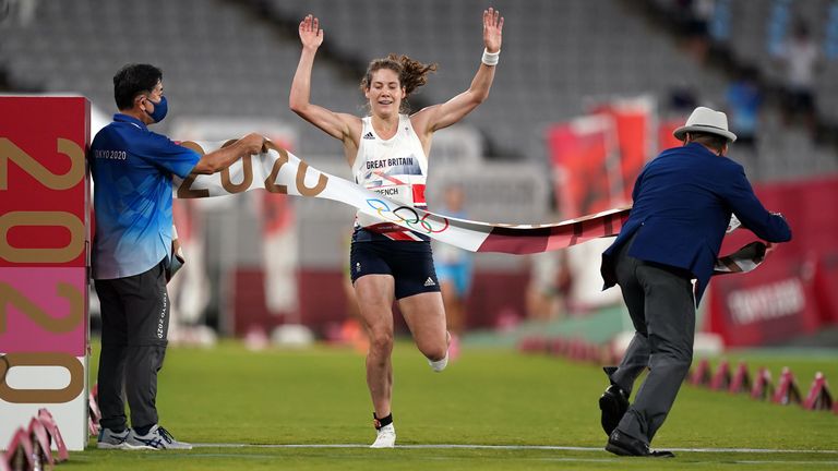Kate French crossing the line and realising that an Olympic gold medal belongs to her