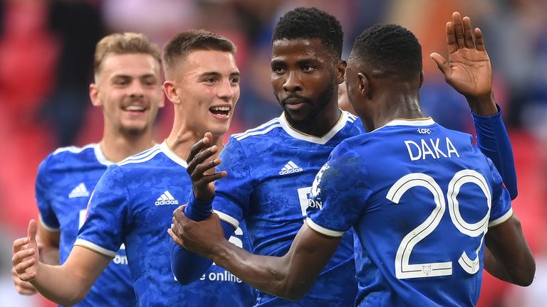 Leicester players celebrate with Kelechi Iheanacho after his late penalty won the Community Shield