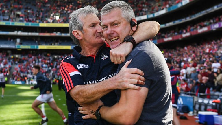 Kingston celebrates with selector Diarmuid O'Sullivan at full-time