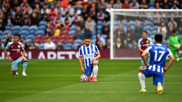 Brighton and Hove Albion&#39;s Neal Maupay (centre) takes a knee before the Premier League match at Turf Moor, Burnley. 