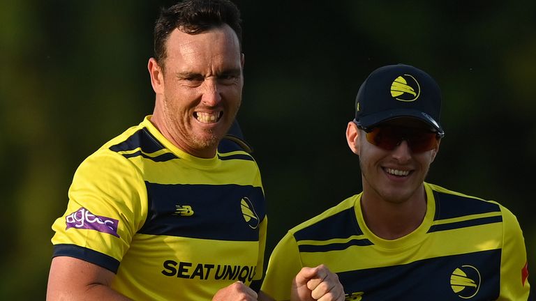 Kyle Abbott (left) took 5-43 as Hampshire eased to victory over Worcestershire in Southampton