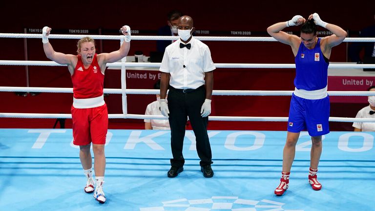 Britain...s Lauren Price, left, and Nouchka Fontlijn, of the Netherlands, react after their women...s middleweight 75-kg boxing match at the 2020 Summer Olympics, Friday, Aug. 6, 2021, in Tokyo, Japan. (AP Photo/Frank Franklin II)                
