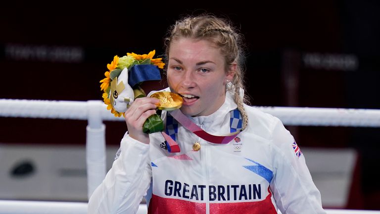 Lauren Price celebrates Olympic gold