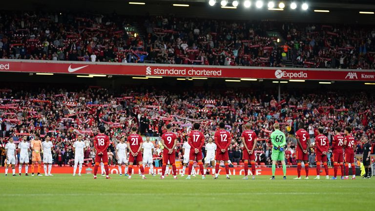 The players observe a moment&#39;s applause ahead of kick-off