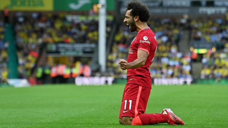 Mo Salah celebrates Liverpool's third