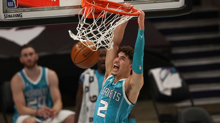 Charlotte Hornets guard LaMelo Ball dunks against the Indiana Pacers during the first half of an NBA basketball game in Charlotte, N.C., Friday, Jan. 29, 2021. 