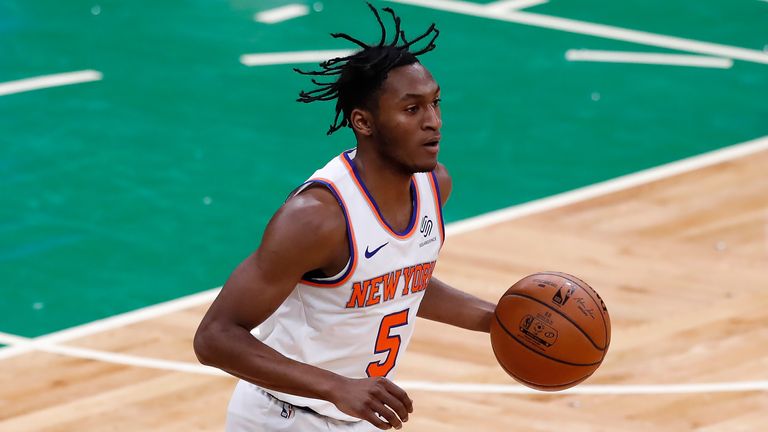 New York Knicks' Immanuel Quickley plays against the Boston Celtics during the first half of an NBA basketball game, Sunday, Jan. 17, 2021, in Boston. (AP Photo/Michael Dwyer)