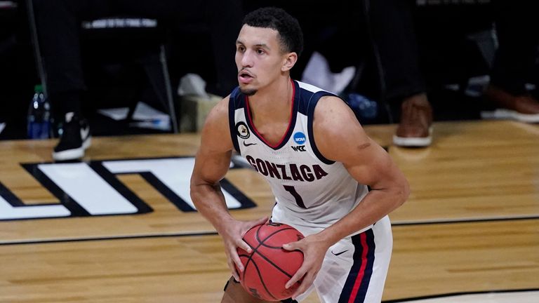 Gonzaga guard Jalen Suggs passes up court during the second half of an Elite 8 game against Southern California in the NCAA men's college basketball tournament at Lucas Oil Stadium, Tuesday, March 30, 2021, in Indianapolis. (AP Photo/Darron Cummings) 