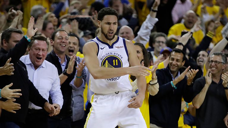 Klay Thompson celebrates in front of fans during the second half of Game 5 against the Houston Rockets in 2019