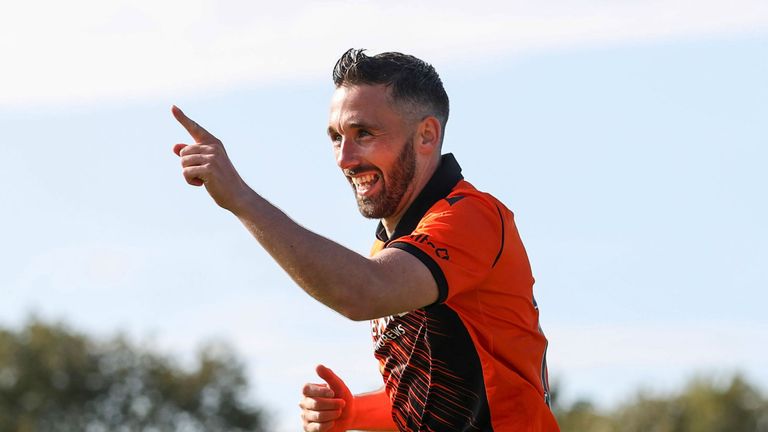 Nicky Clark's two goals from the spot ensured Dundee United avoided an upset