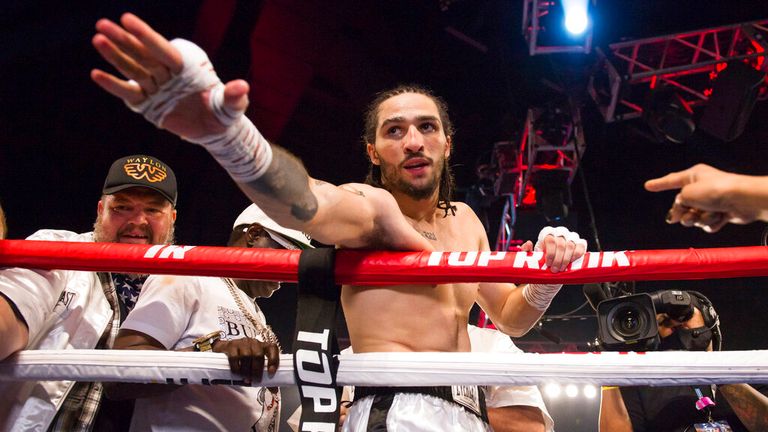 Nico Ali Walsh reaches out to shake a hand after defeating Jordan Weeks in their Middleweight fight at the Hard Rock Casino Theater in Catoosa, OK on 8/14/21.  BRETT ROJO/For the Tulsa World