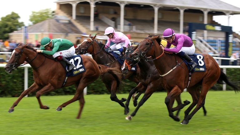 Night Of Romance ridden by Dylan McMonagle (left) wins The William Hill Extra Place Races Racing League Race Eight at Doncaster