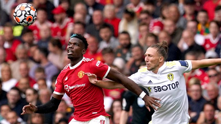 Paul Pogba and Luke Ayling battle for the ball 