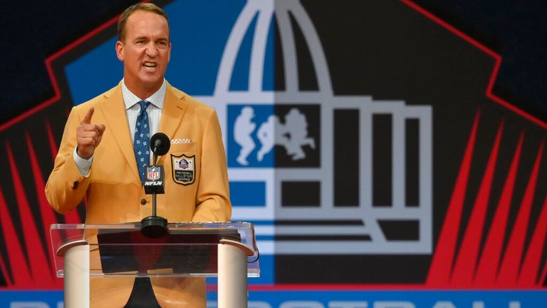 Peyton Manning, a member of the Pro Football Hall of Fame Class of 2021, speaks during the induction ceremony at the Pro Football Hall of Fame, Sunday, Aug. 8, 2021, in Canton, Ohio. (AP Photo/David Richard)