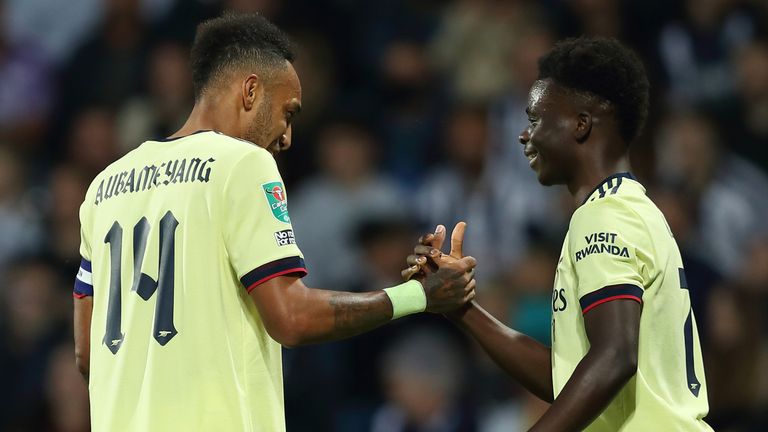 Pierre-Emerick Aubameyang celebrates his opener with Bukayo Saka 