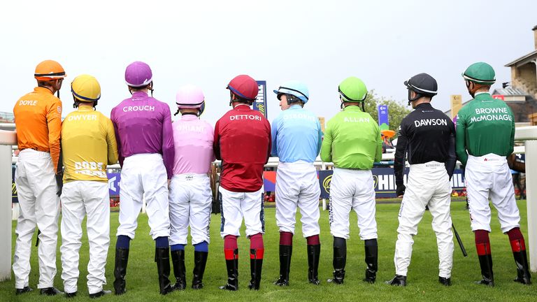 Frankie Dettori lines up with his fellow Racing League jockeys before the first at Doncaster
