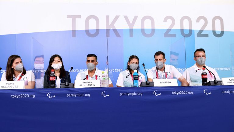 Members of the Refugee Paralympic Team (RPT) taking part in a pre-Paralympics press conference