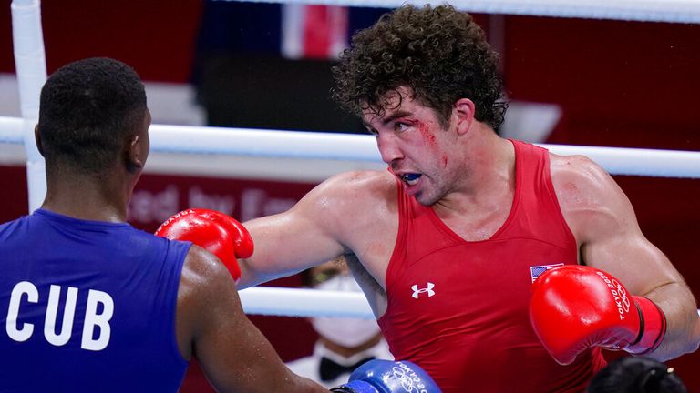 Richard Torrez Jr., from the United States, right, exchanges punches with Cuba...s Dainier Pero during their men...s super heavyweight over 91-kg boxing match at the 2020 Summer Olympics, Sunday, Aug. 1, 2021 , in Tokyo, Japan.  (AP Photo/Frank Franklin II) 