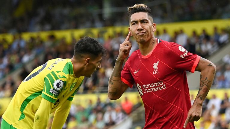 Roberto Firmino celebrates after scoring Liverpool&#39;s second goal at Carrow Road