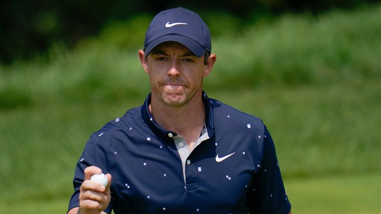 Rory McIlroy, of Northern Ireland, reacts after putting on the third green during the third round of the BMW Championship golf tournament, Saturday, Aug. 28, 2021, at Caves Valley Golf Club in Owings Mills, Md. (AP Photo/Julio Cortez)