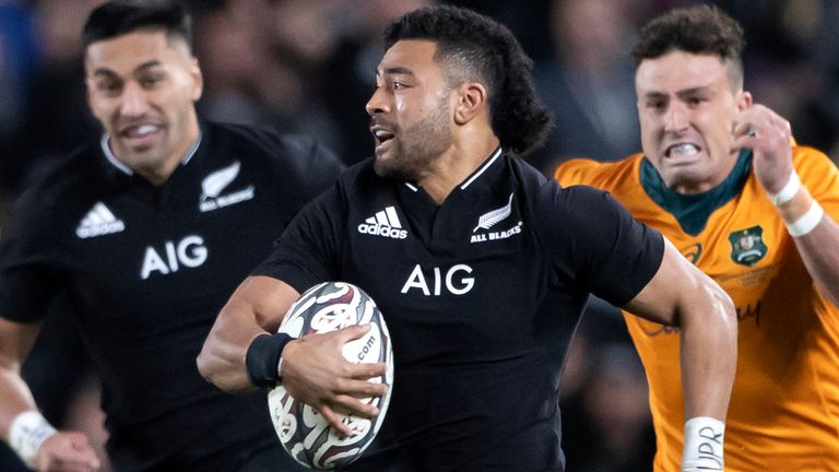 New Zealand's Richie Mo'unga races clear of the Australian defence
