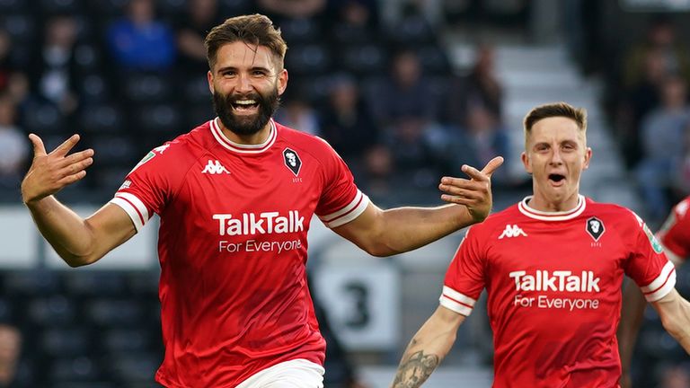 Salford City's Jordan Turnbull (left) celebrates scoring against Derby in Carabao Cup first round