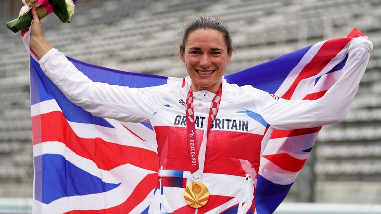Sarah Storey has equalled Mike Kenny's British record of 16 Paralympics gold medals with victory in the C5 time trial 