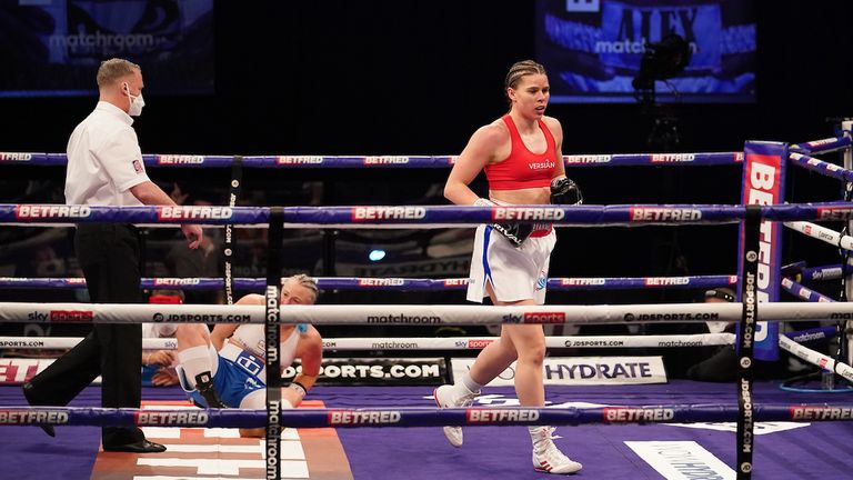 *** FREE FOR EDITORIAL USE ***.Savannah Marshall vs Maria Lindberg, WBO World Female Middleweight title Fight..10 April 2021.Picture By Dave Thompson Matchroom Boxing.Savannah Marshall walks away after knocking down her opponent for the second and final time. 