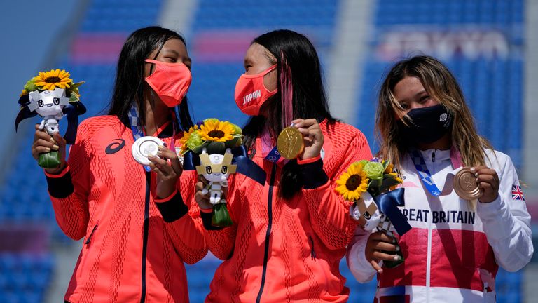 Brown collects her bronze medal on the podium in Tokyo