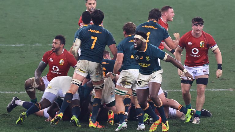South Africa captain Siya Kolisi celebrates as they secure the series win against the Lions