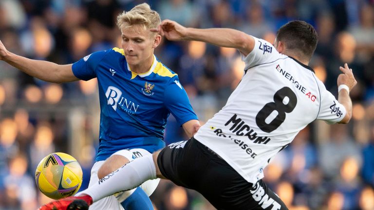 PERTH, SCOTLAND - AUGUST 26: St Johnstone's Ali McCann (left) battles with Peter Michorl during a Europa Conference Qualifier between St Johnstone and LASK at McDiarmid Park on August 26, 2021, in Perth, Scotland (Photo by Craig Foy / SNS Group).