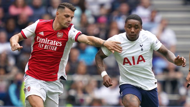 Tottenham Hotspur's Steven Bergwijn and Arsenal's Granit Xhaka battle for the ball