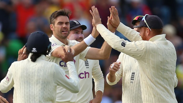 England's James Anderson celebrates the wicket of India's Cheteshwar Pujara
