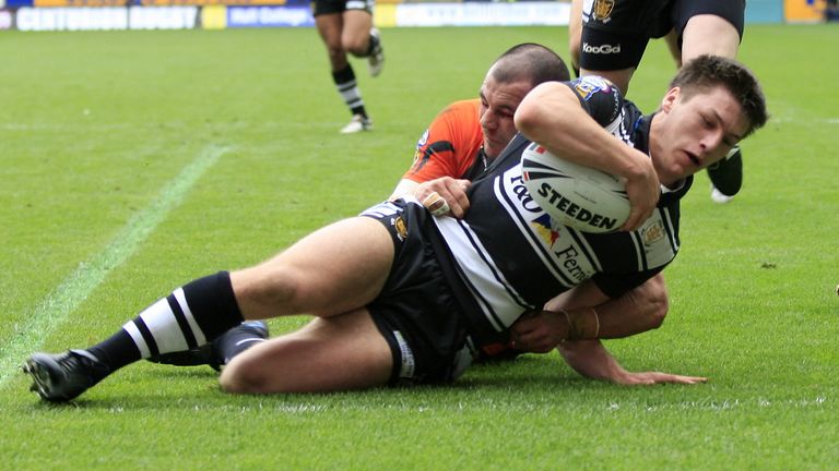Pix: Chris Mangnall/SWpix.com, Rugby League, Super League. 10/04/09 Hull FC v Hull Kingston Rovers....picture copyright>>Simon Wilkinson>>07811267 706>>....Hull FC's Tom Brisco scores FC's First Try tackled by Hull KR's Ben Galea
