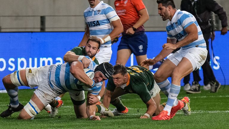 Tomas Lavanini is tackled by Cobus Reinach