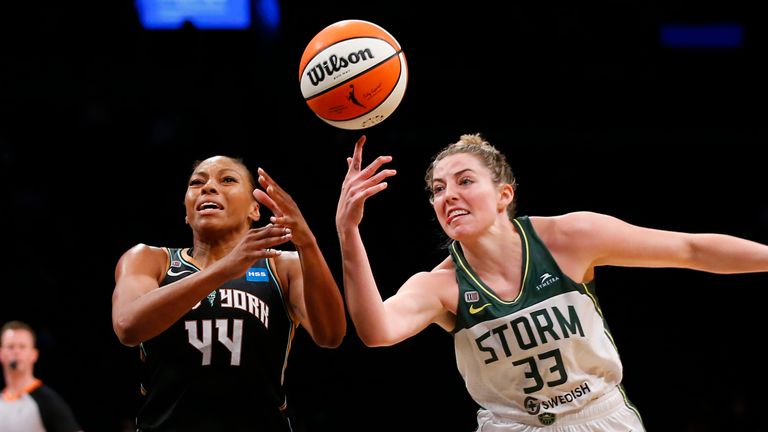 Seattle Storm forward Katie Lou Samuelson (33) knocks the ball out of the hands of New York Liberty guard/forward Betnijah Laney (44) during the second half of a WNBA basketball game Wednesday, Aug. 18, 2021, in New York.