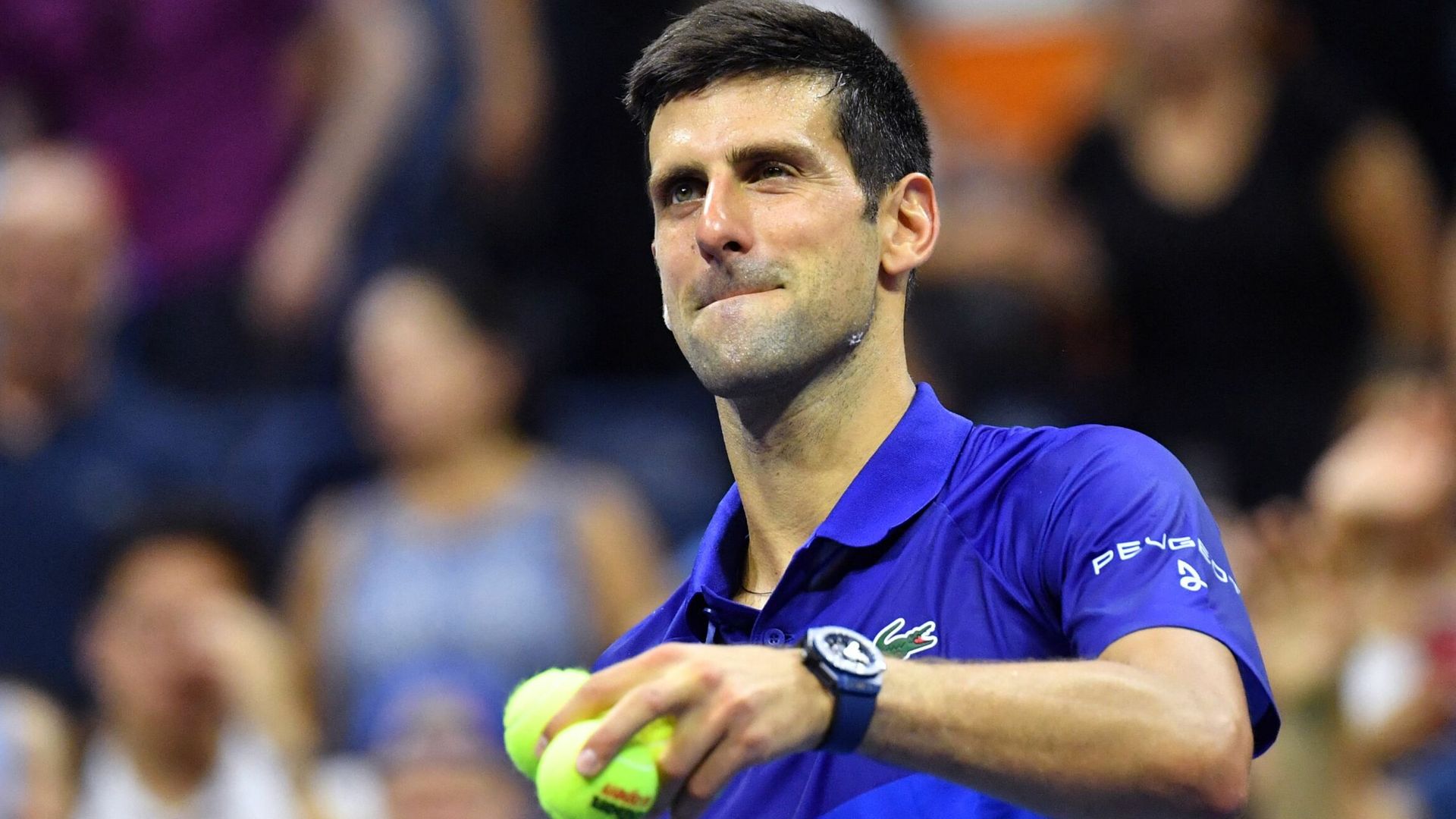 Djokovic survives scare to keep calendar Slam bid on track
