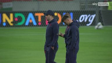 England players walk Hungary pitch