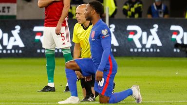 Fans in Hungary boo as England take a knee