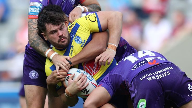 Picture by John Clifton/SWpix.com - 05/09/2021 - Rugby League - Dacia Magic Weekend 2021 - Wigan Warriors v Warrington Wolves - St. James's Park, Newcastle, England - Warrington Wolves' Joe Philbin in action with Wigan Warriors' Oliver Partington  , Joe Shorrocks and Kai Pearce-Paul