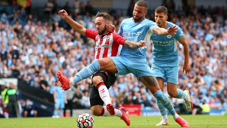 Adam Armstrong is challenged by Kyle Walker resulting in a penalty and red card for the Man City full-back, both of which are overturned following a VAR review