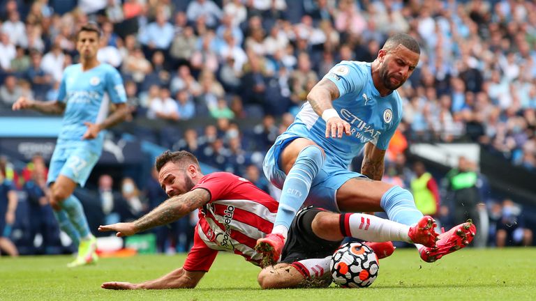 Adam Armstrong is challenged by Kyle Walker resulting in a penalty and red card for the Man City full-back, both of which are overturned following a VAR review