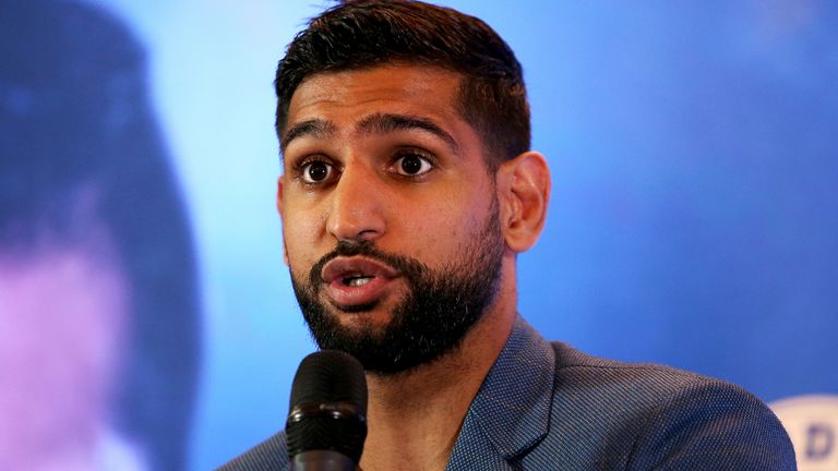 Amir Khan and colleague removed from American Airlines flight after ...